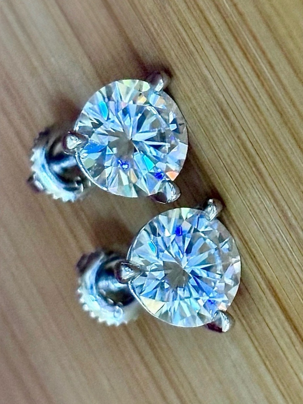 A 4ctw certified pair of Moissanite martini studs with screw-on ear nuts!